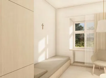 Schlichtes, helles Gästezimmer mit Kreuz an der Wand